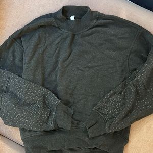 Lululemon x SoulCycle sweatshirt with reflective detailing and balloon sleeves